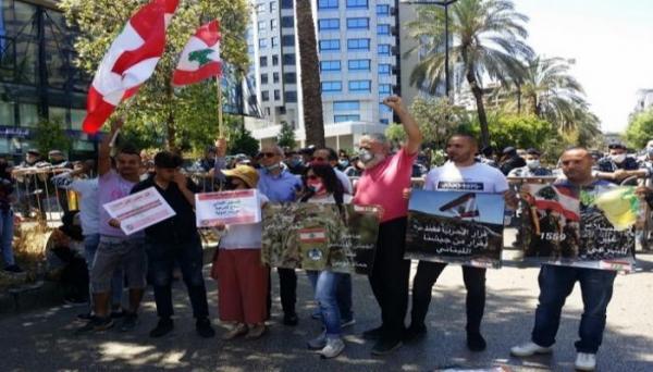 تظاهرة في بيروت ضد حزب الله و قبرص تسلم أميركا أحد عناصره الإرهابية