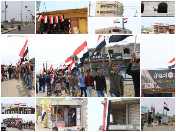 صور| ابتهاجًا بعيد الثورة.. مديريات الساحل الغربي تتوشّح العلَم الوطني